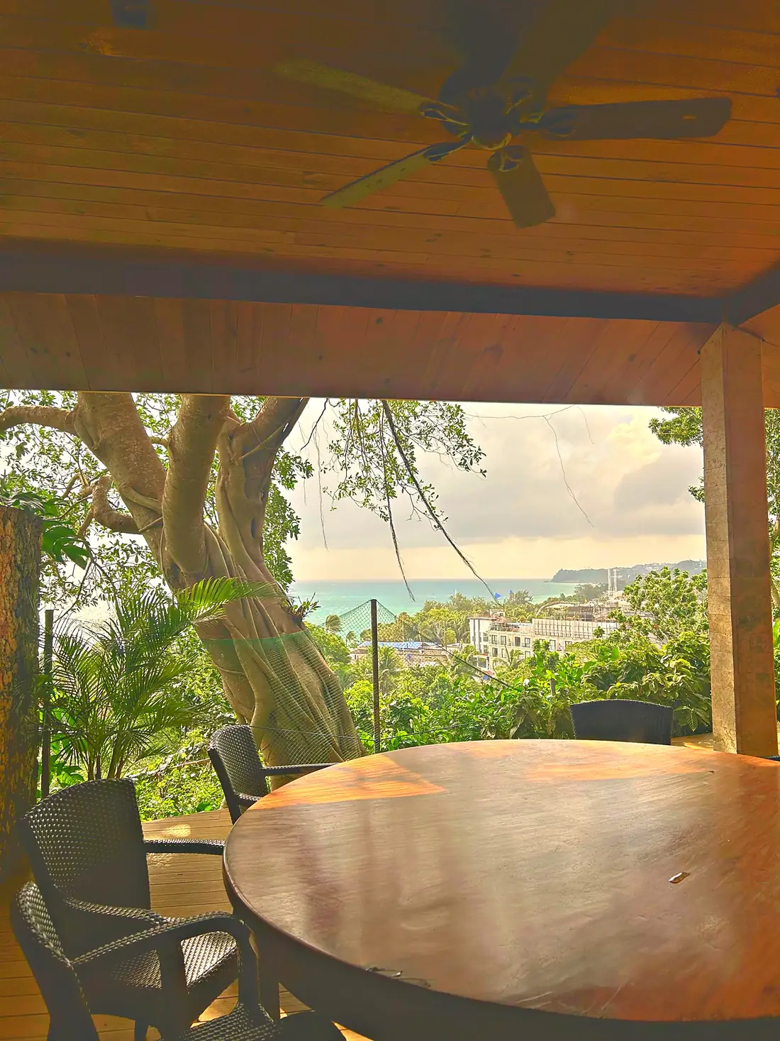Covered dining terrace overlooking the coastline